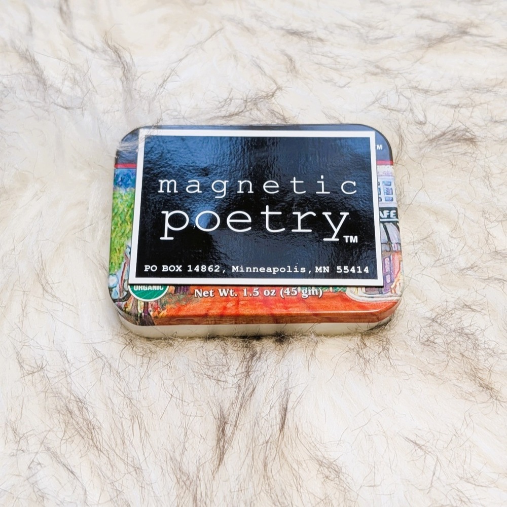 Magnetic Poetry Kit Stored in a Magnetic Container